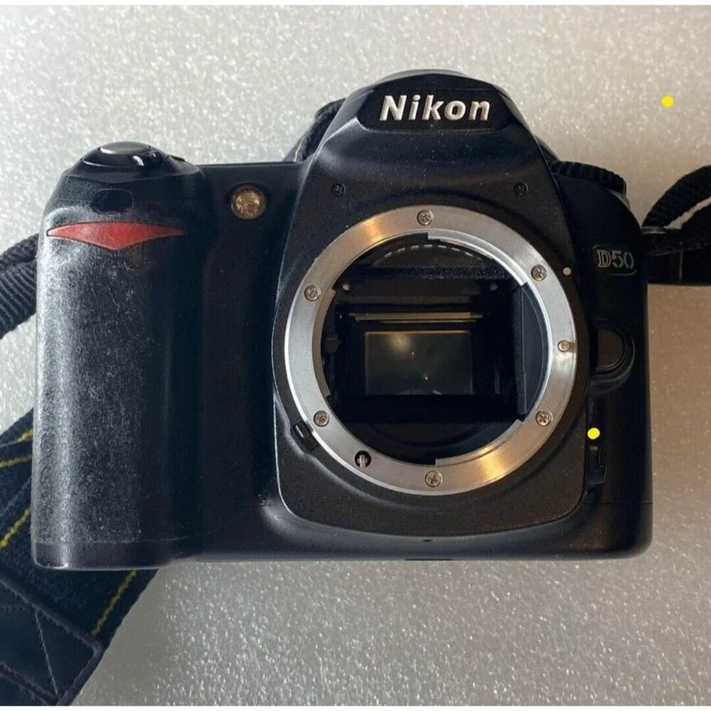 Nikon D50 6.1 MP Digital SLR Camera - Silver (Body Only)